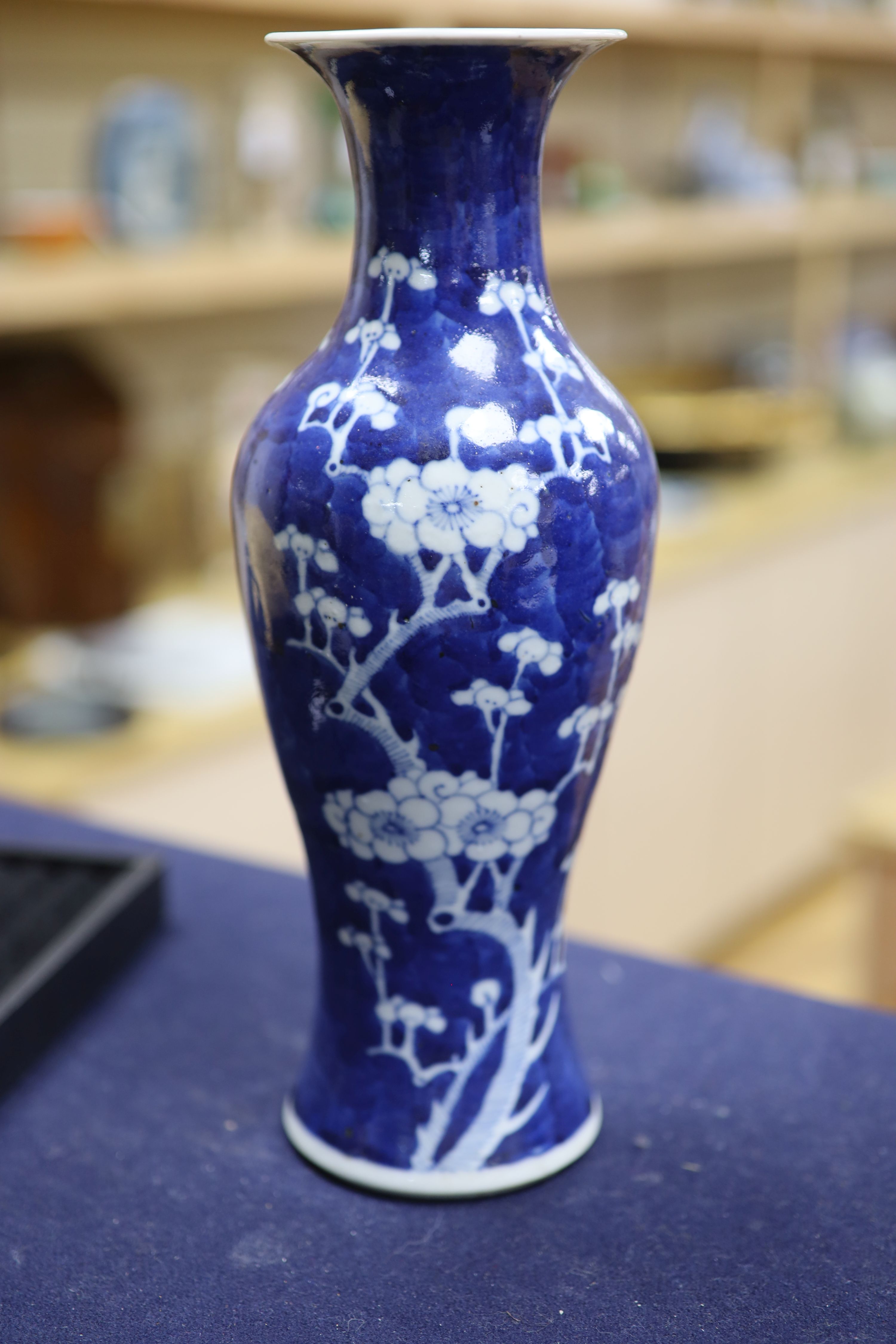 A pair of slender Chinese blue and white prunus vases, late 19th century, height 30cm